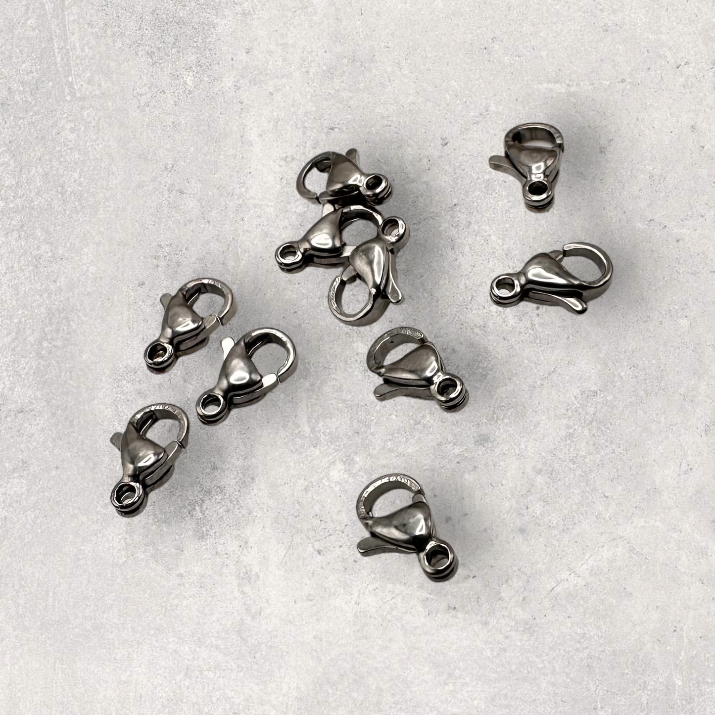 Cerraduras tipo Lobster 9x6 mm