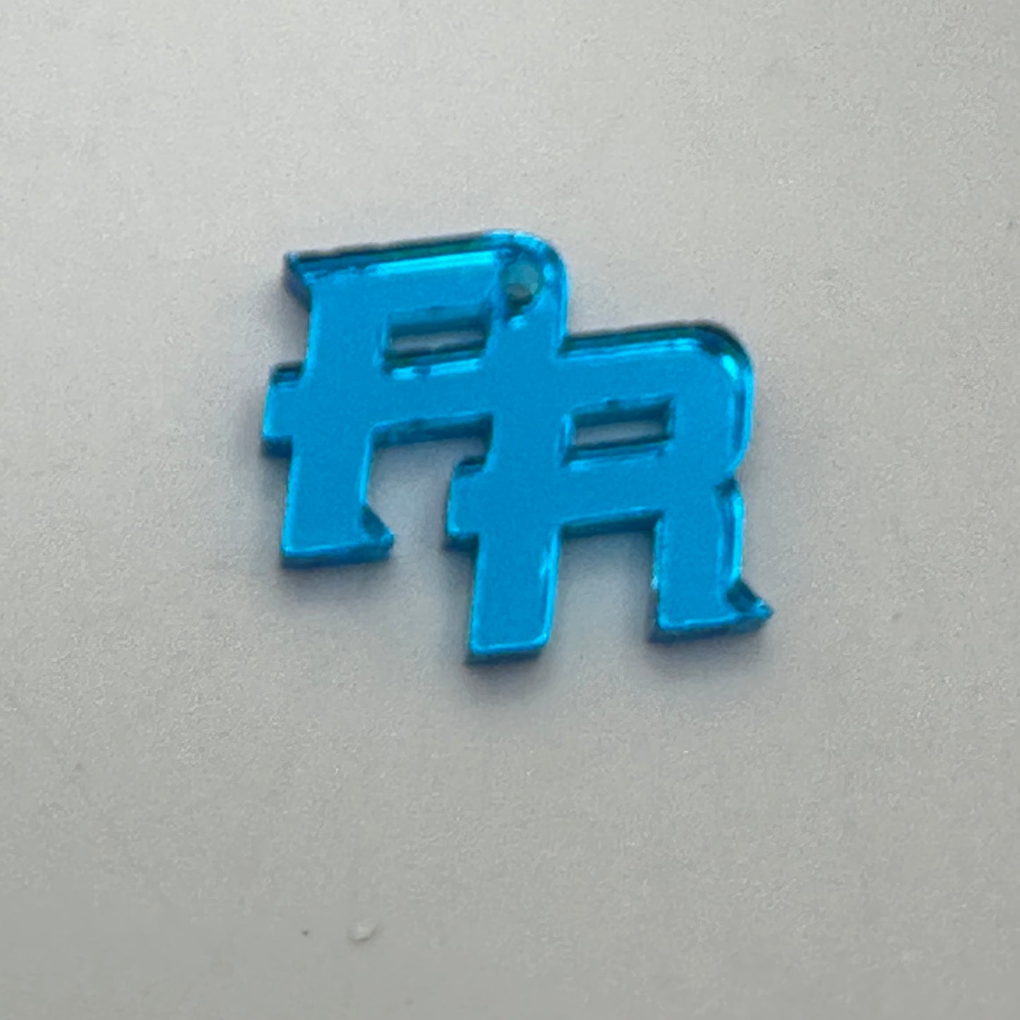 PR pendant azul espejo