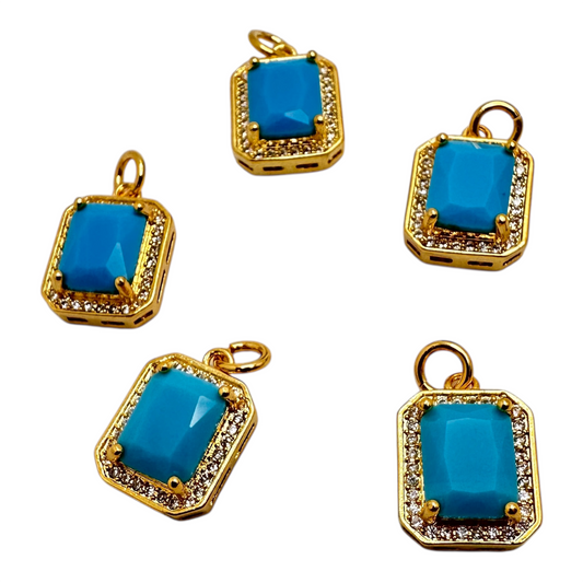 Dije Rectangular con piedra azul cielo GP 18k